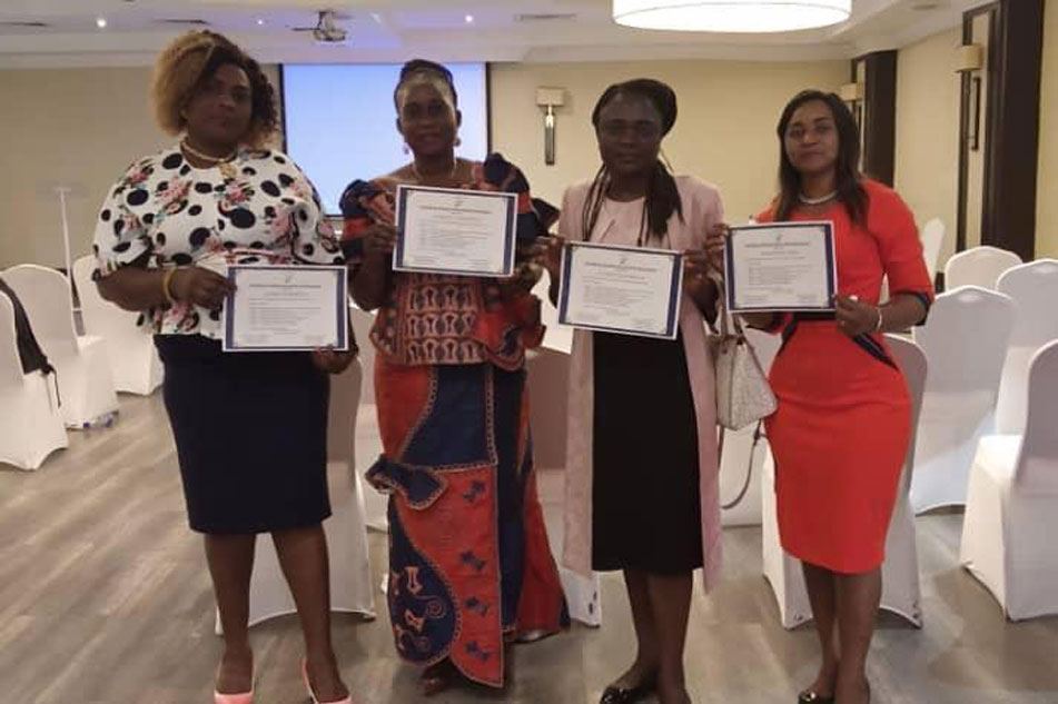 DYFREN women members hold their certificates after a capacity-building session