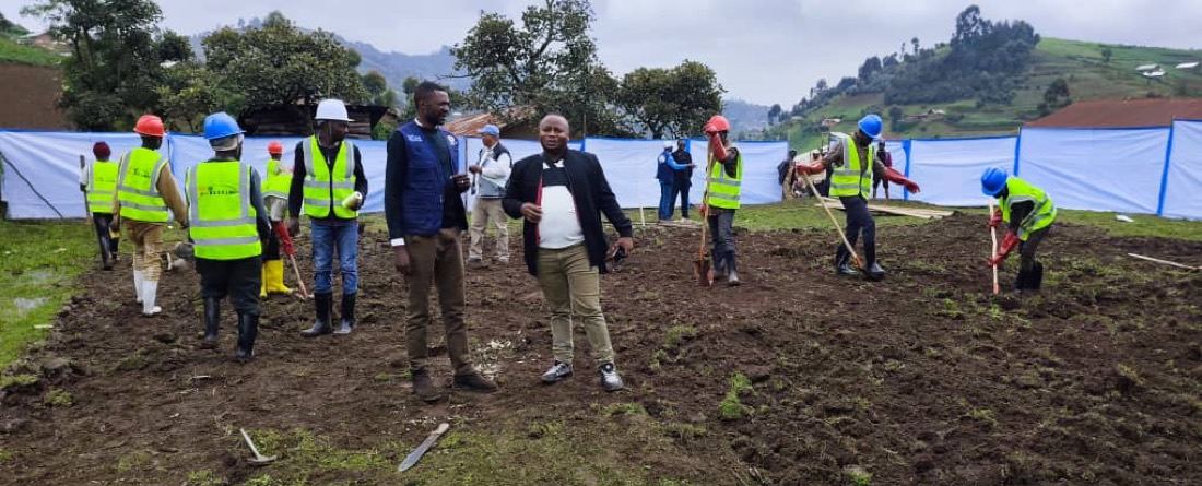 SYDIP staff and partners prepare a project site on terraced farmland in the North Kivu hills