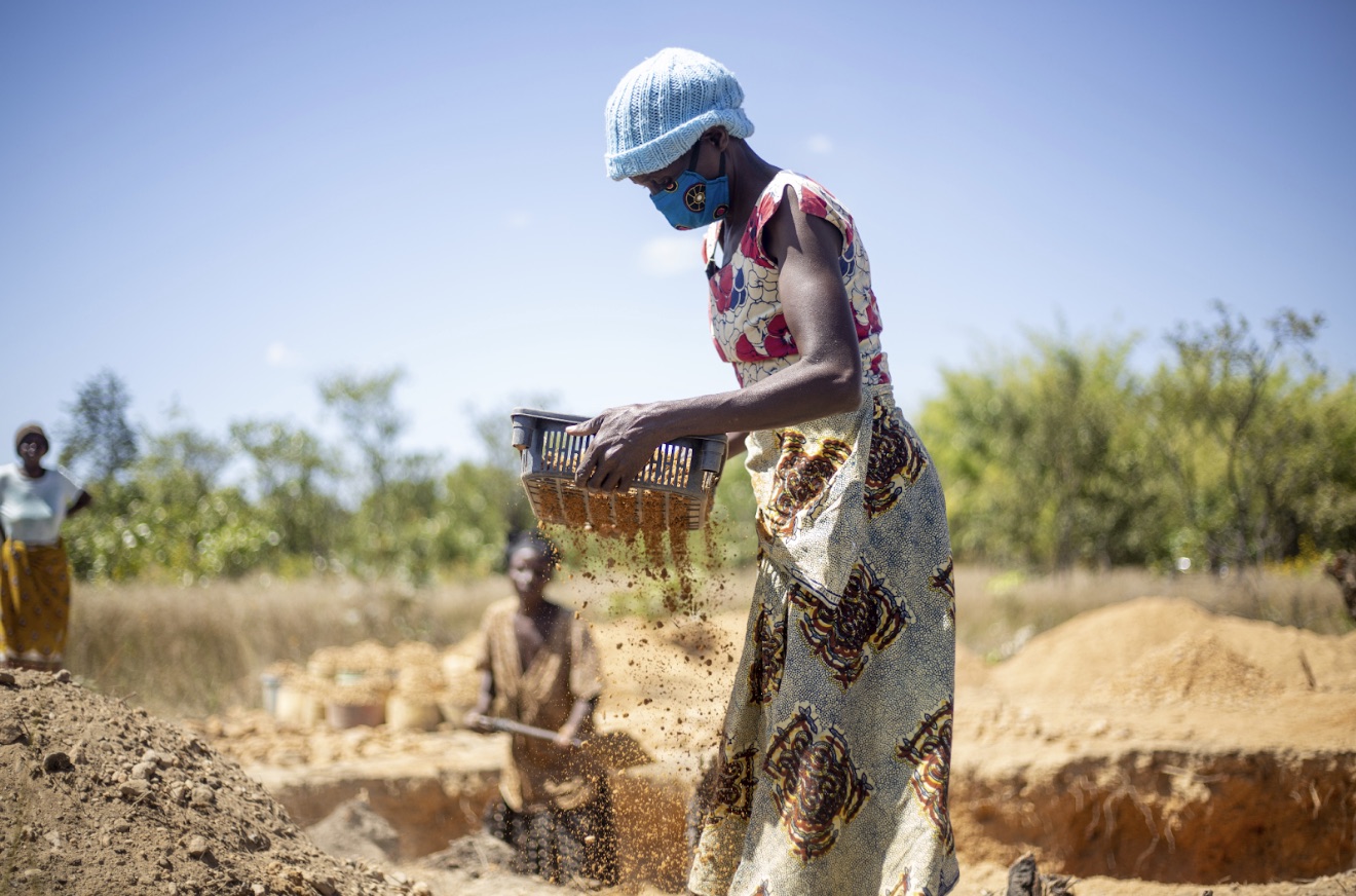 A woman working at an artisanal mining site in the eastern Democratic Republic of Congo